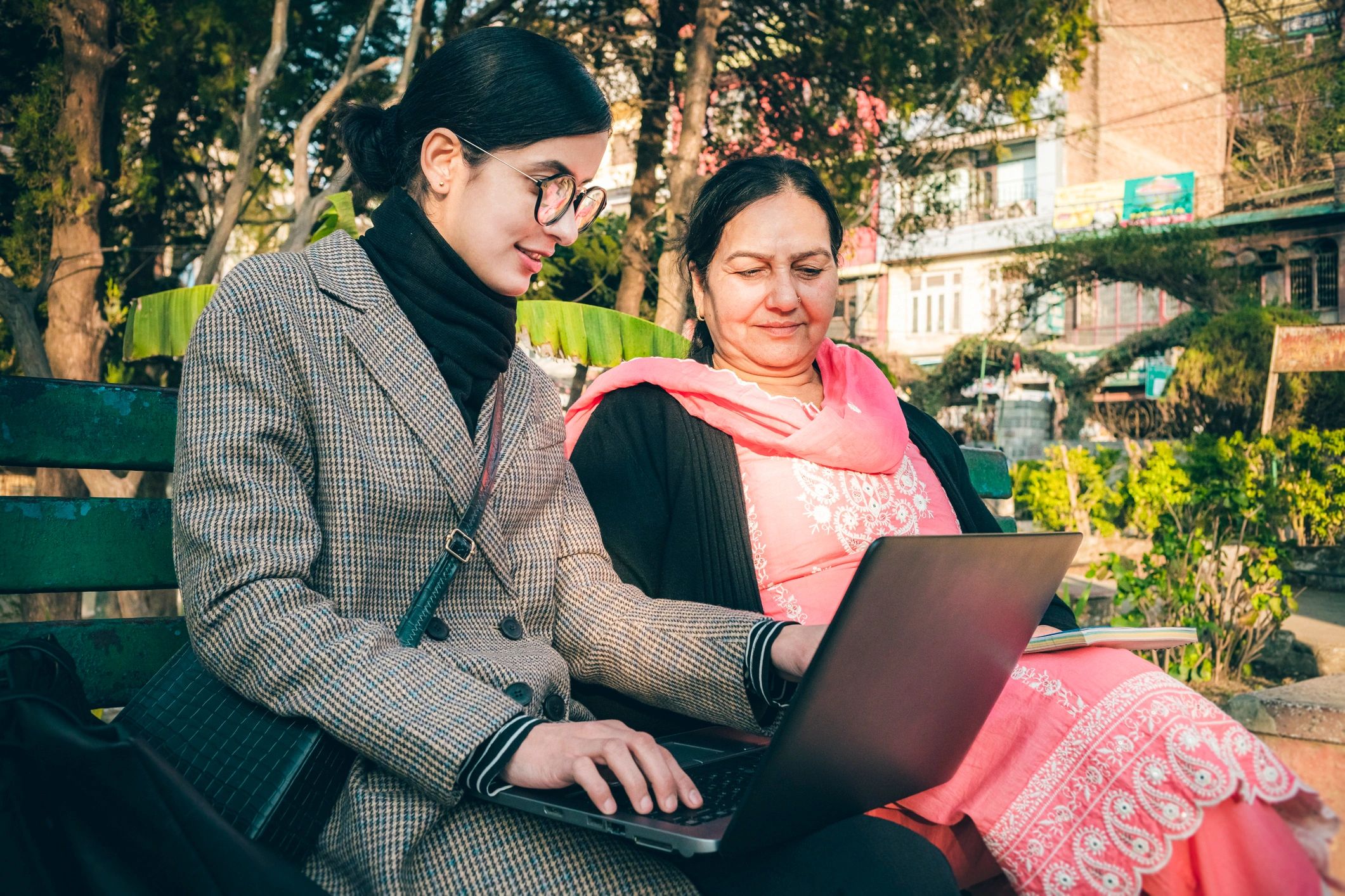 Two professionals collaborating and taking notes